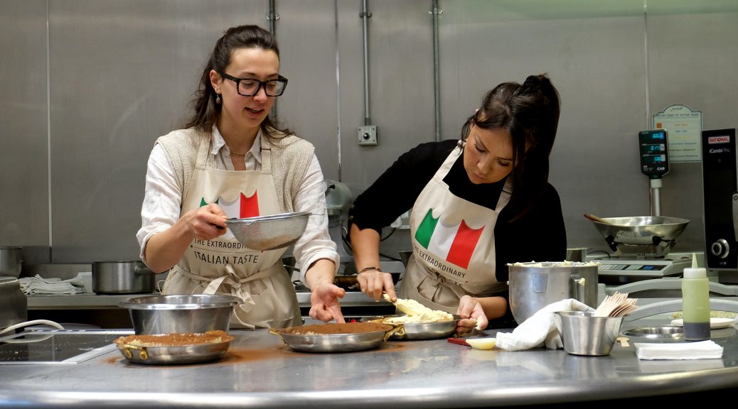 Two women cooks doing a demo
