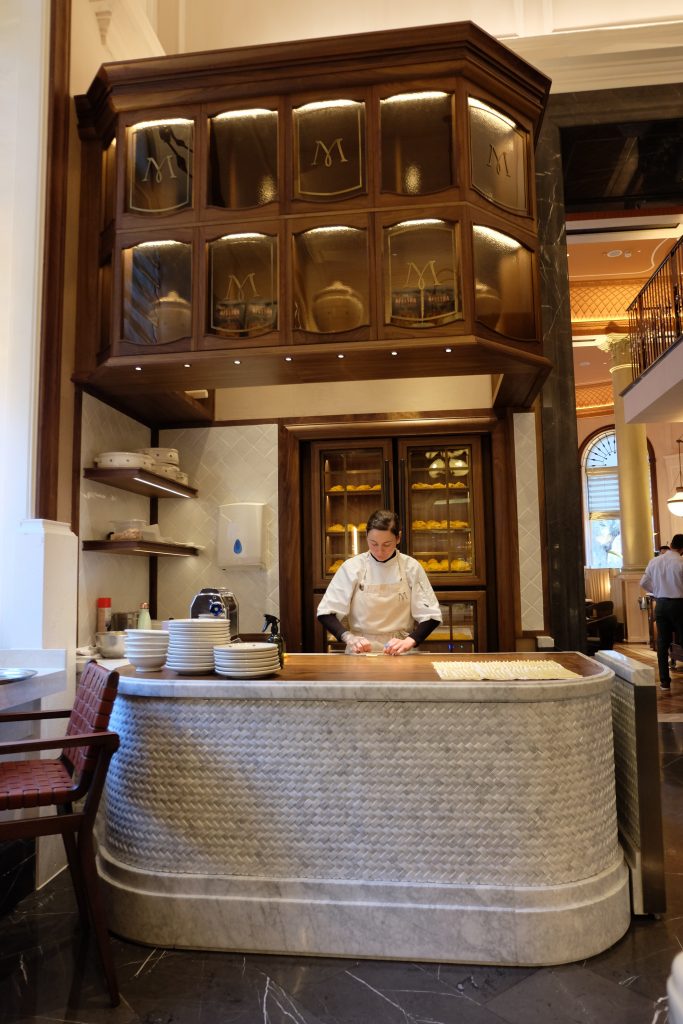a chef rolling pasta at Mezzogiorno restaurant